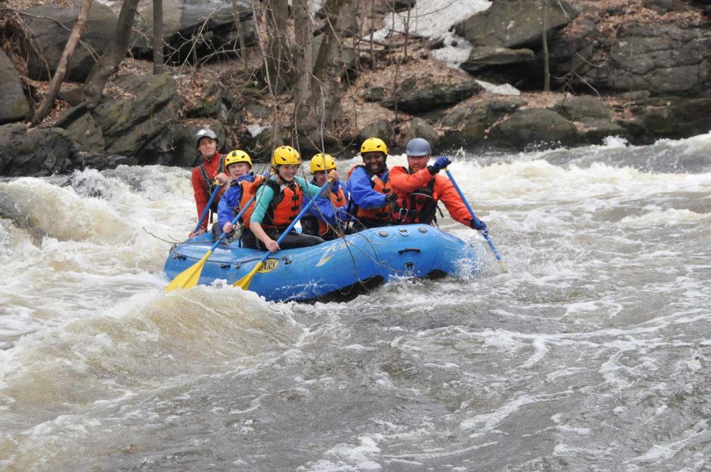 Image of a group of people whitewater rafting