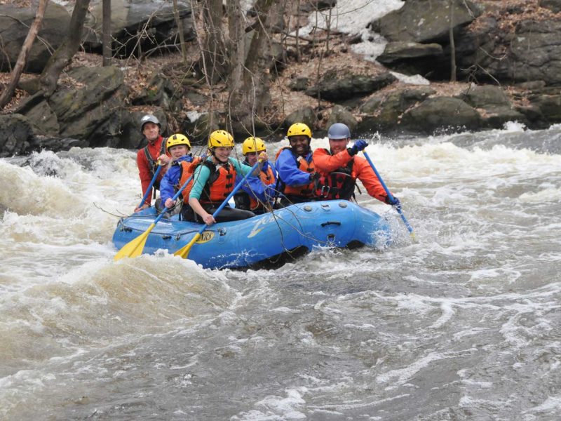 Image of a group of people whitewater rafting