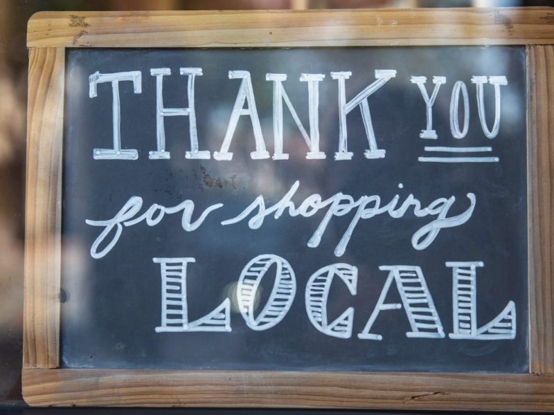 a thank you for shopping local sign