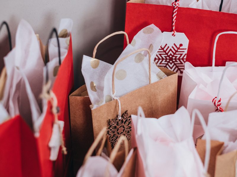 Photo of shopping bags with holiday tissue paper